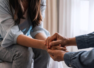 Showing hands being held